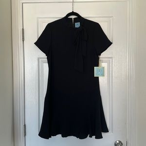 Cece - short sleeve, too neck bow. Black. Size 6.